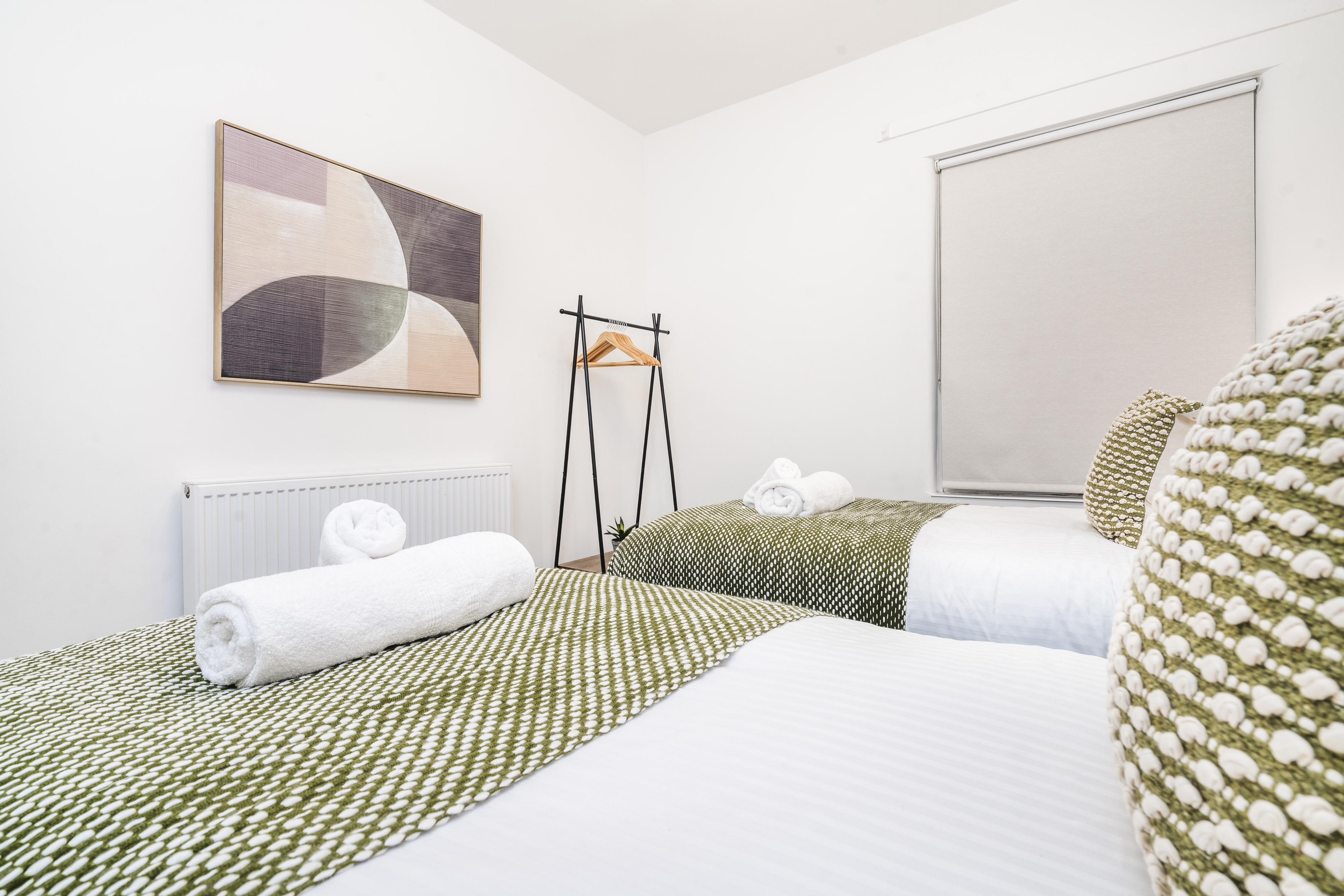 The Heron bedroom interior - comfortable short-stay accommodation